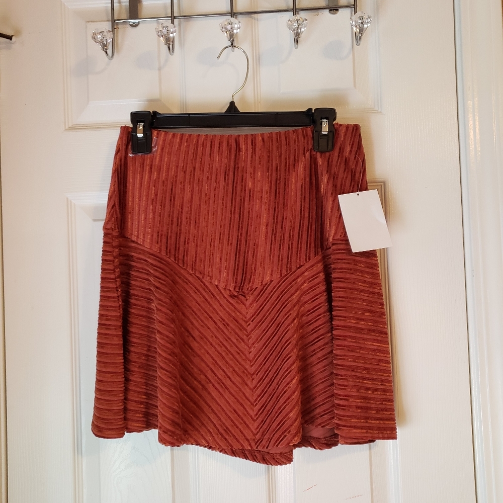 Free people skirt  size M color light brown.